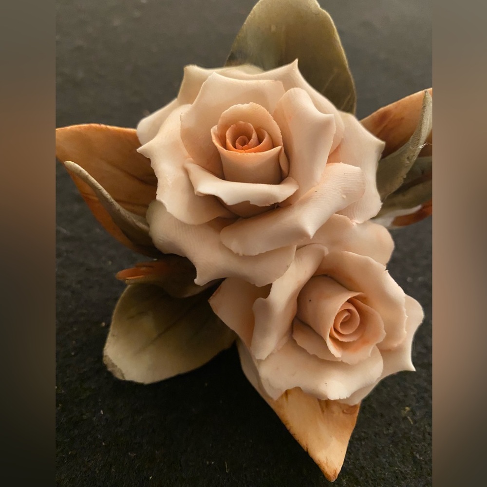 Porcelain Flowers are 4” x 5” some chip not noticiable see photo. Handmade.